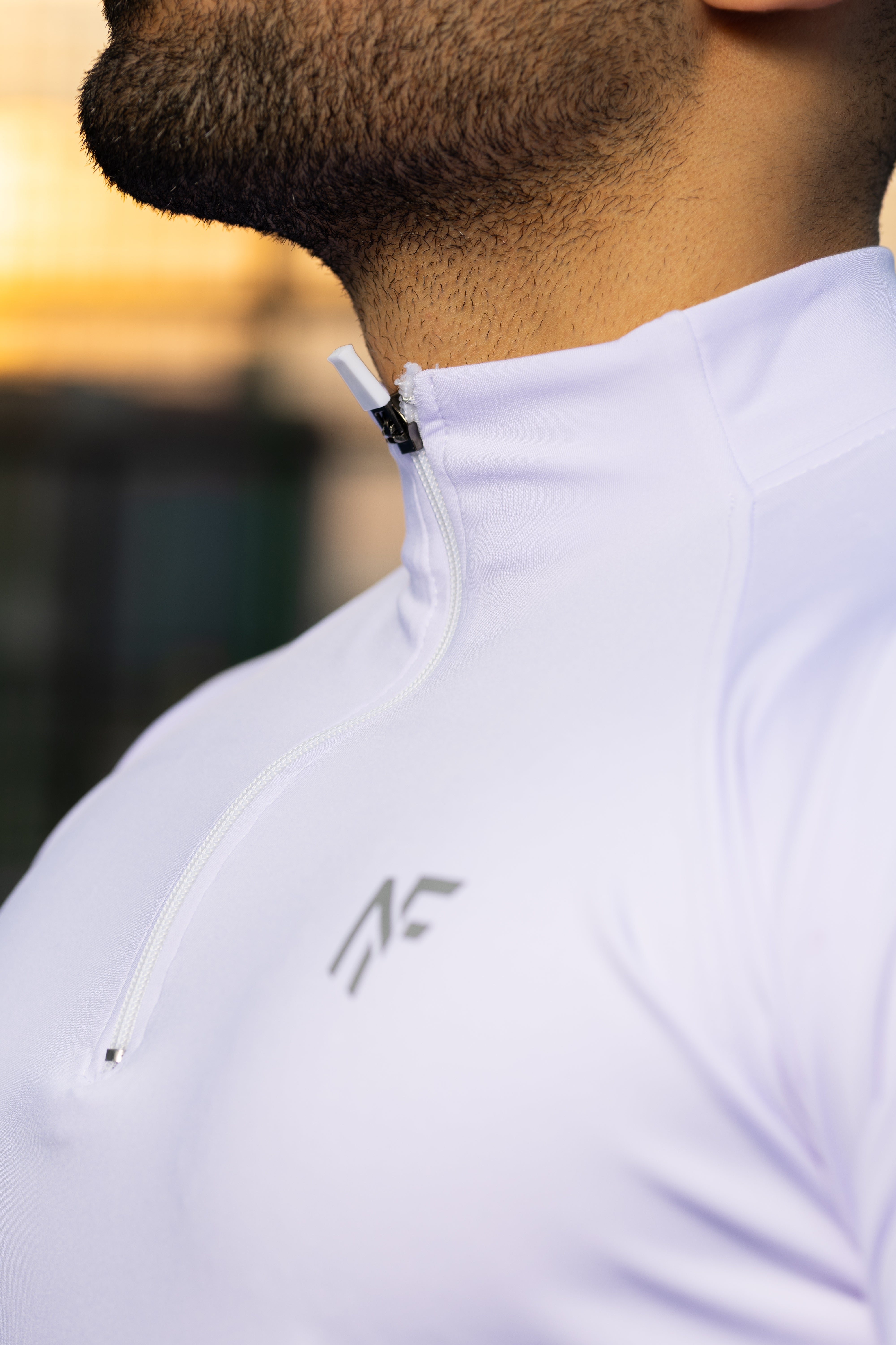 Negma Fit Performance Quarter-Zip Training Top – White