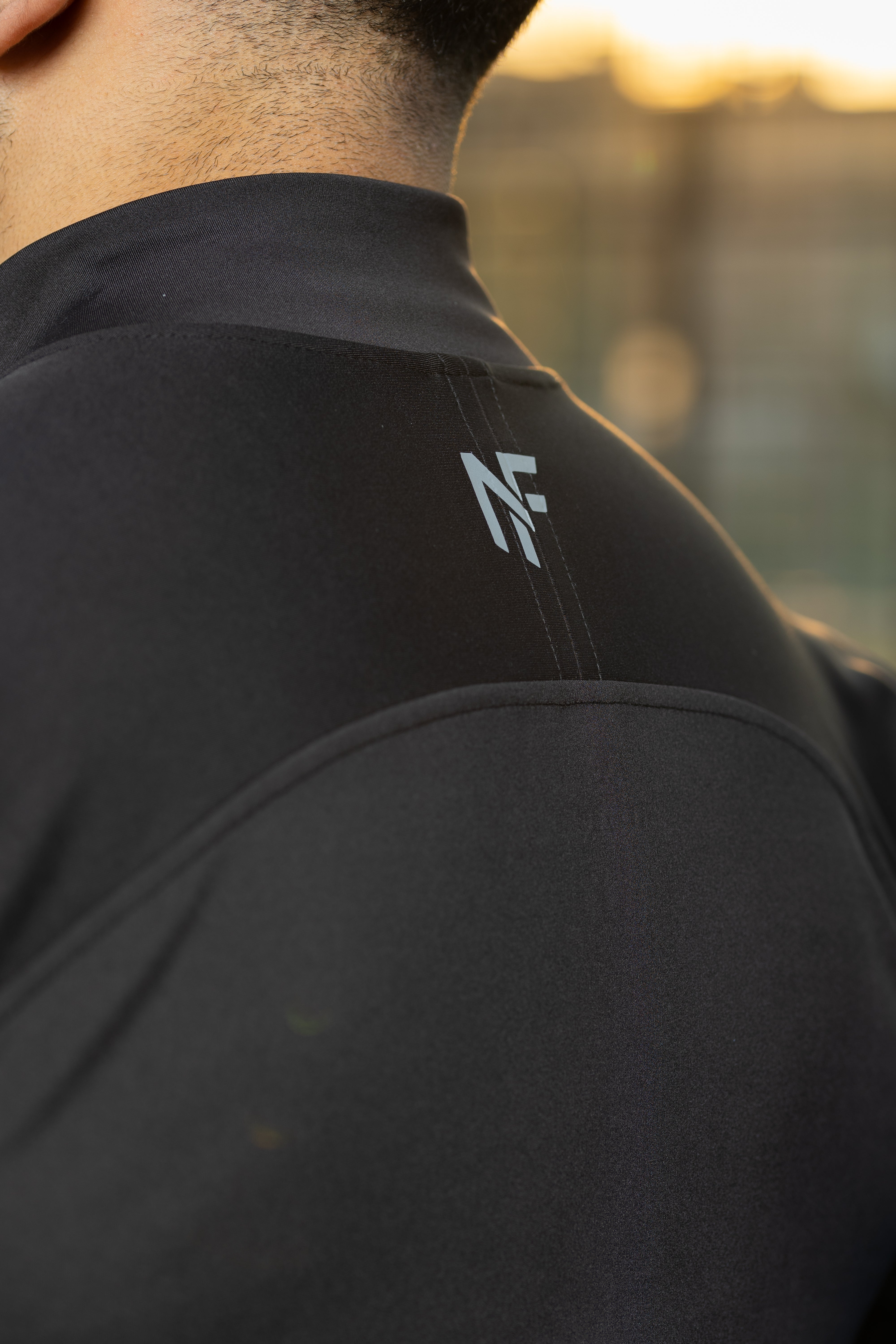 Negma Fit Performance Quarter-Zip Training Top – Black